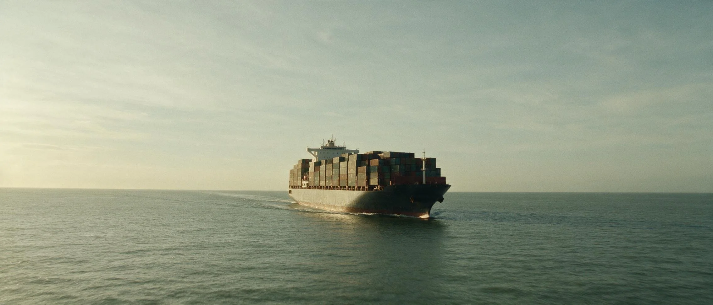 Container ship at sea in open water